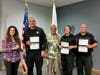 Mayor Nicole Milovich-Walters (left to right), Sgt. Ross Chibe, Commissioner Dan Polk, and Ofcrs. Rebecca Duffy, John Winter and Brain Adcock. The officers were recognized as "Top DUI Cops" by AAIM.
