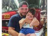 A Garden Homes firefighter hang out with his little fire buddy Rylon.