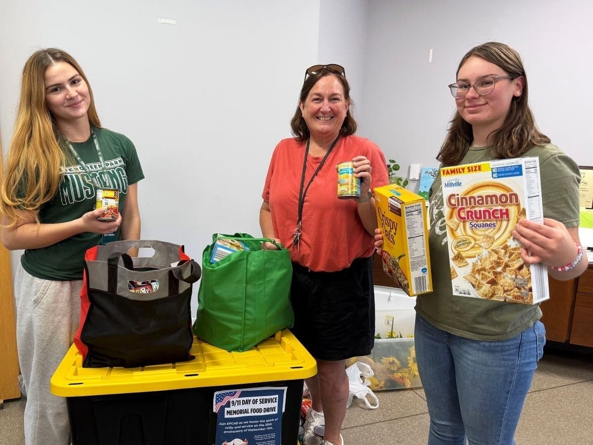 Evergreen Park Community High School students, teachers and residents band together to collect donated food items for the EP food pantry. 