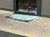 A pile of broken glass lies on the doormat where a smash-and-grab crew bludgeoned their way into La Cocina de Mama Restaurant in Oak Lawn to steal cash boxes from the gaming machines. 