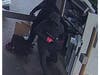 Surveillance images show two men alleged to have robbed an ATM technician while servicing a machine at Huntington Bank at 74th Street and Cicero Avenue in Bedford Park.