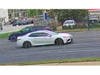 The alleged ATM robbers fled in a white car, believed to be a Toyota Camry, the FBI said. 