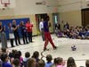Harlem Wizard James Tyndall, aka The Road Runner impresses both Lincoln school students and staff with his basketball skills