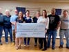 Elks Lodge members presenting a check for $5,329.17 to Safe Kids CT Director Amy Watkins, MPH, third from right, included (l-r) Don and Lori Percoski, Mark Morin, Jerry's daughter Jessica Reed, Darlene McCray, Laura Ennis, Rob McCray and Steve Stathis.