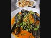 Curry mussels are another featured small plate item, designed to share along with other ample-sized small plates