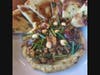 Blasé Bistro's Spiced Lamb hummus is one of the featured small plates on the new menu, which also is offered during Happy Hour