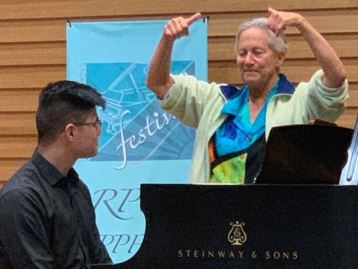 Rebecca Penneys works with a student at RPPF, a tuition-free festival that brings together 36 of the world’s aspiring collegiate pianists to work with world-class faculty. Performances and sessions will be available on-line to the general public.