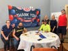  (left to right) Marci Bradway of Windover, residents Matthew Nobrega, Maryann Quinn, Harlan Murdoch (sitting), Kelly Neihoff of Windover, and resident Robert DeFrancesco
