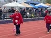 Special Olympics Athletes running track