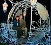 Brock and Ann Roby taking a ride in Cinderella's carriage