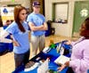JustServe club members visit other booths
