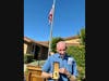 Joe Rollins holding his purple heart