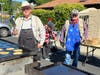Lowel Hoxey and Bruce Smith grilling pancakes for the breakfast.