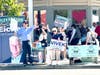 Craig Eicher waving to motorists