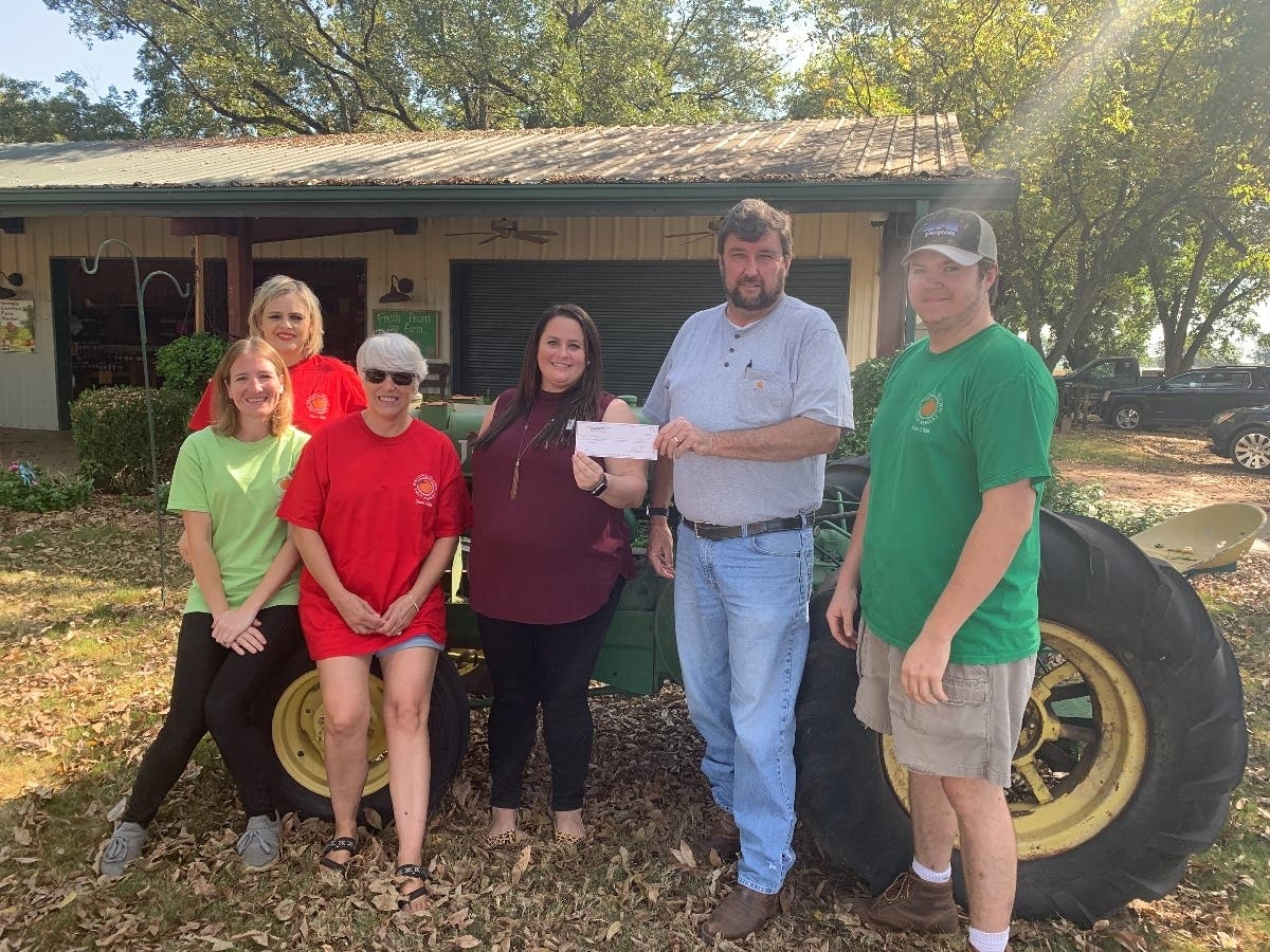 Left to Right: Kim Brown (slightly behind), Taylor Stephens, Loren Brown, Kaitlyn Morris, Manager – Field Development – Autism Speaks, Howard Brown, Witt Brown