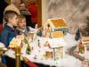 Little ones marvel at the candy craftsmanship of The Garlands gingerbread village. 