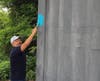 Artist Marlon Davila begins painting Delaware River Mural for D&R Greenway's new Kayak Ed. Program, Bordentown Beach