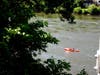 Contented kayaker on Delaware River, taken from bridge