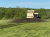 Truck spreads Soil Carbon Partners Soil Amendation mixture on D&R Greenway's St. Michaels Farm Preserve