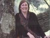 CEO/President Linda J. Mead in iconic oak tree of Greenway Meadows