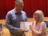 William Warren receives his award from Margaret Howard at the Salem HIgh School Awards Night. 