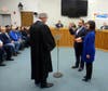 Tax Collector Vince Deon sworn in with Grace Deon holding bible