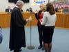 Auditor Liz Youse sworn in with State Repo Wendi Thomas holding bible