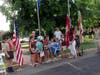 Girl Scouts from Troop 209 talk about the flag