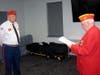 Commandant Mike Clark (L) being sworn in by District 2 Vice Commandant Gene Irvin.