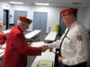 District 2 Vice Commandant Gene Irvin (L) presents the gavel and congratulates Commandant Mike Clark. 