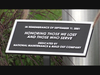 Plaque under new flagpole