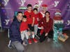 At the Madison Area YMCA’s 3rd Annual Holiday Hoopla are the Chaput family of Madison: John, Cameron, 2, Cole, 7, Cooper, 5, and Melissa.