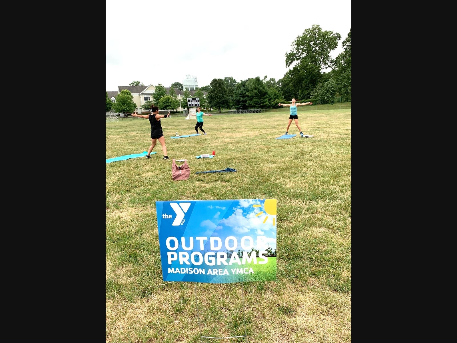 (L-R) Madison Area YMCA members Jane McMahon from Chatham and Elizabeth Ledoux from Florham Park enjoy Friday morning outdoor Cardio H.I.I.T. class with Y instructor Marilou Beard of Madison taking place at Bayley Ellard Field in Madison. 