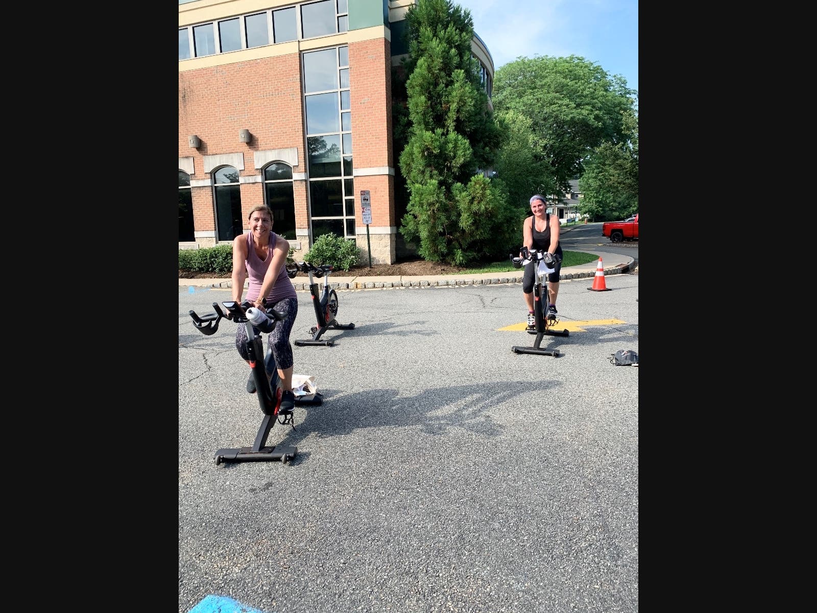 Pictured ready for Outdoor Cycle class at the Madison Area YMCA’s Family Center parking lot are Y members Anne DeSalvo from Morristown and Adrienne Simeone from Madison. 