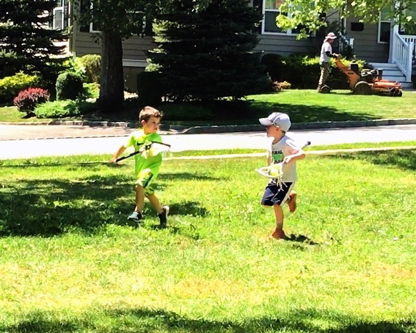 Lacrosse students Max Kain, age 4 from Madison and Becket Reed, age 5 from Florham Park enjoy running a drill during their Summer Session I Lacrosse class. 