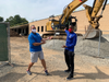 Pictured is Competitive Aquatics Director and Head Swim Coach Jon Siegel and Associate Sports Director Aaron Goodwin standing next to what will be our new two pool Aquatics Center and double Basketball Gymnasium.