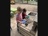 Pictured are Alexandra Barrese age 3, from Chatham and Fionn O’Leary age 4, from Madison using nature in their creative play on one of the four age-appropriate playgrounds at Kirby. 