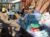 To sort through all the generous donations from the community, Madison Area YMCA volunteers moved outdoors to multiple tables on the Keep Street patio.