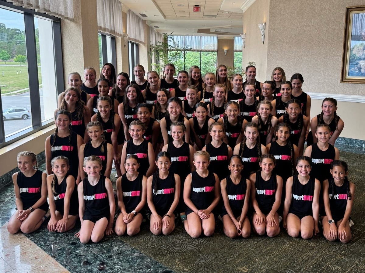 Members of the Madison Area YMCA Rosettes Gymnastics Team gather at the 2026 YMCA National Gymnastics Championship in Greensboro, North Carolina, after an outstanding week of competition. See the accompanying article for names.