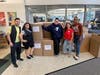 Community members Alejandro Ocampo and Adriana Lopez join Gladys Alvarado, Member Services Representative; Allison Bardon, Senior Director of Mission Advancement; and Christina Gordon, Madison Chatham Coalition Project Coordinator.