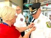 A member of the Voorhees Police Department receives a First Responders’ pin from Sharon Wenner of Samaritan.