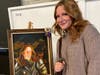 Haddon Heights Jr. Sr. High School student Collette Ayscue poses with her self-portrait, which won a first place ribbon at the Tri-State DisAbility Art Show.