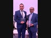 Dr. Tushar Patel, President of Health Camp of New Jersy - right with award of Public Health Hero - NJBIZ 2025 