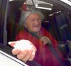 Gail Meyers holds a snowball during a road trip to Lake Tahoe.