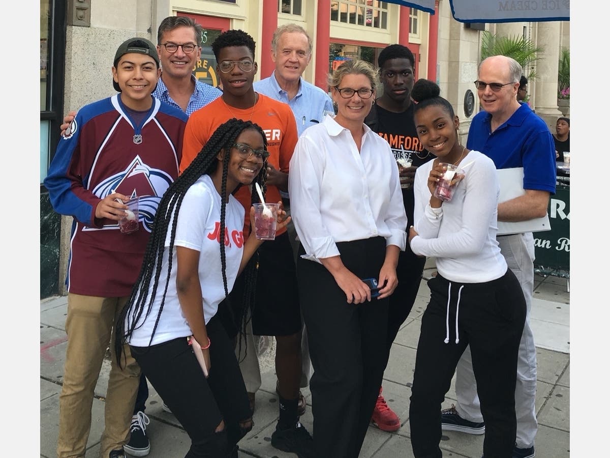 Future 5 Executive Director Rachel Dewey with students and coaches pre-Covid-19