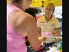 SNAP coordinator Juliet Ziak greets clients with smiles every Wednesday at the Welcome Booth.