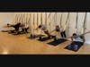 The group uses the studio's wall ropes for some fun poses.