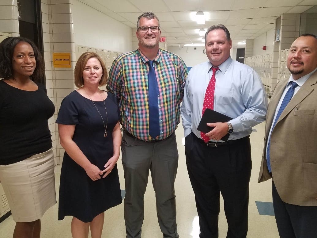 From left, Eisenhower Asociate Principal MaLinda Majoch; Shepard Associate Principal Jennifer Pollack; Richards Principal Mike Jacobson; Shepard Principal Greg Walder; Eisenhower Principal Erik Briseno.