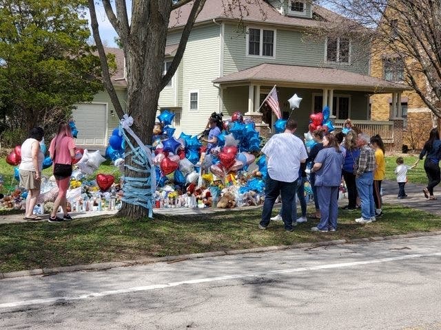Residents dropped off stuffed animals, flowers and balloons to 94 Dole Avenue in Crystal Lake. 