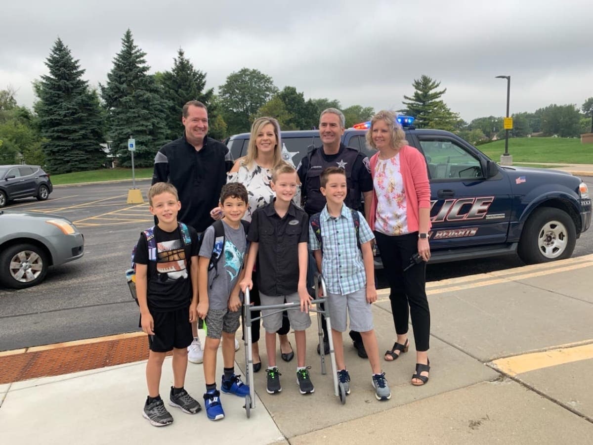 Ryland and his brother got a memorable first day back to school ride to Greenbrier Elementary School in an Arlington Heights Police Department car. 